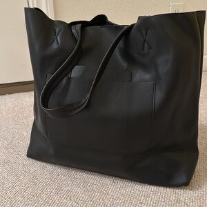 Black Urban Outfitters tote bag